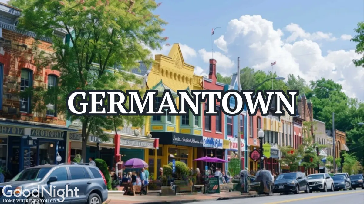 This image shows a vibrant Nashville neighborhood scene with colorful storefronts, people walking along the sidewalk, green trees, and parked cars. The atmosphere is lively and welcoming, suggesting a place bustling with local culture, art, and community activity.